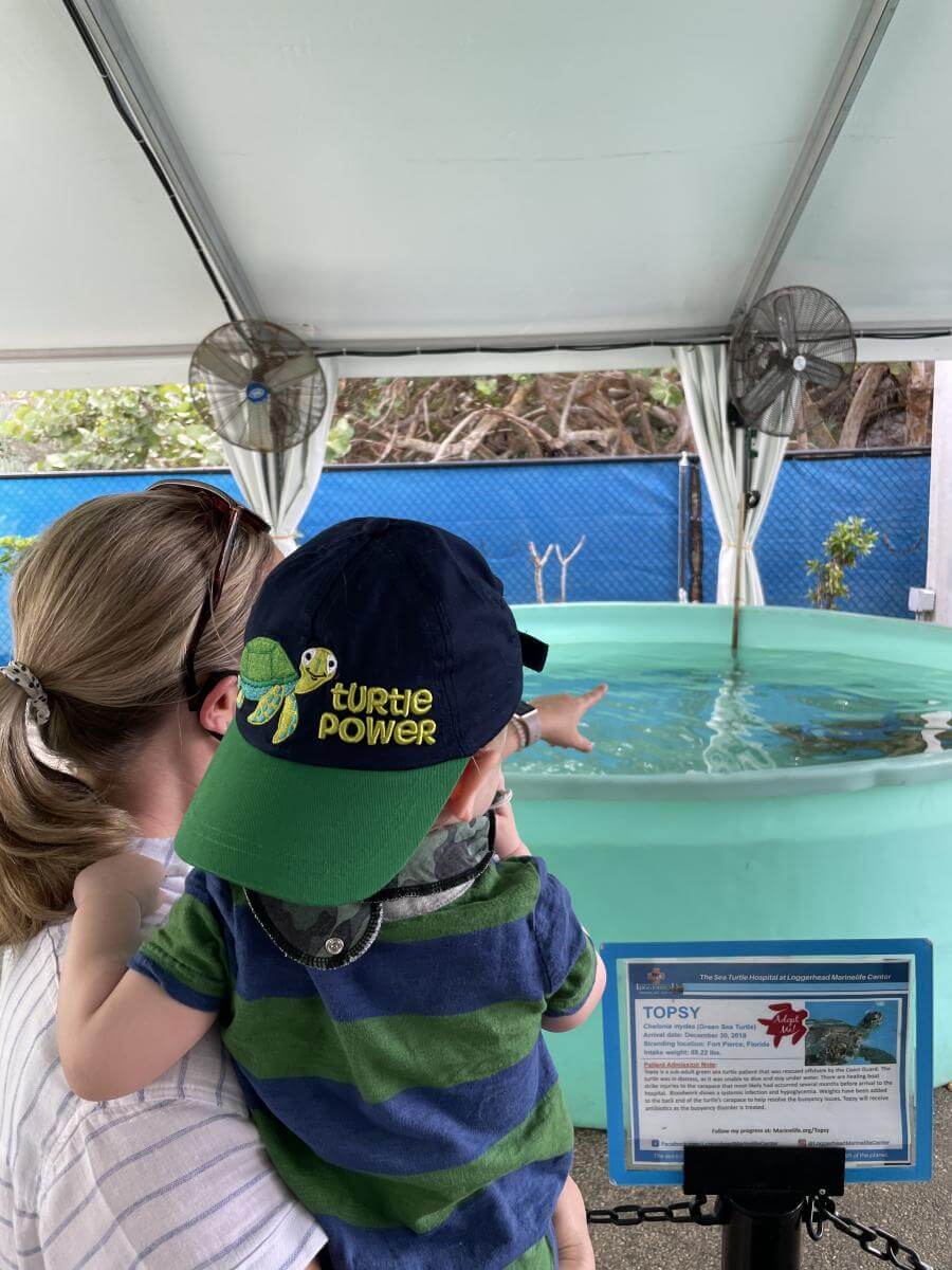 Chef Lindsay Autry with her son at Loggerhead Marinelife Center