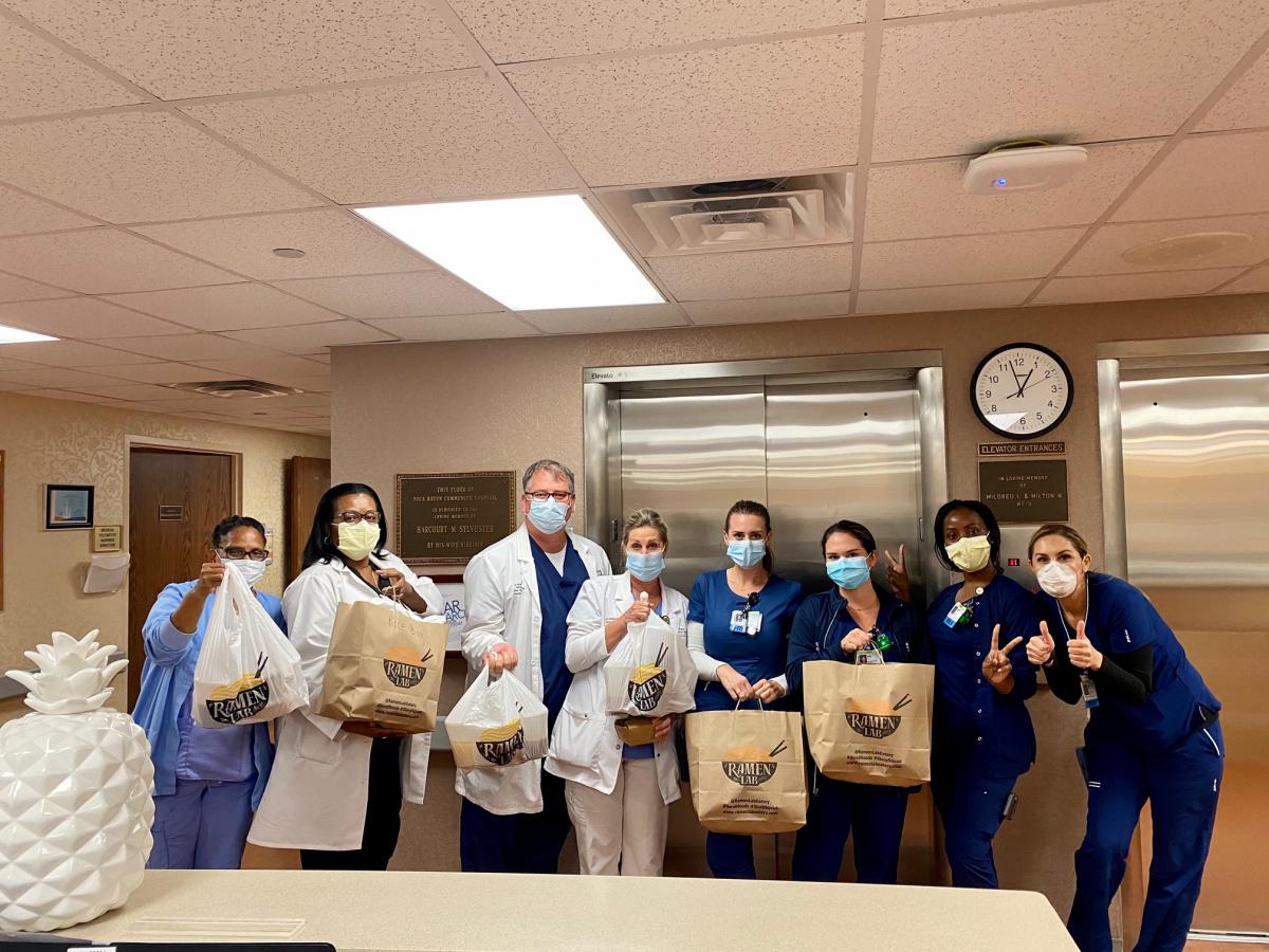 Medical Professionals with Food from Ramen
